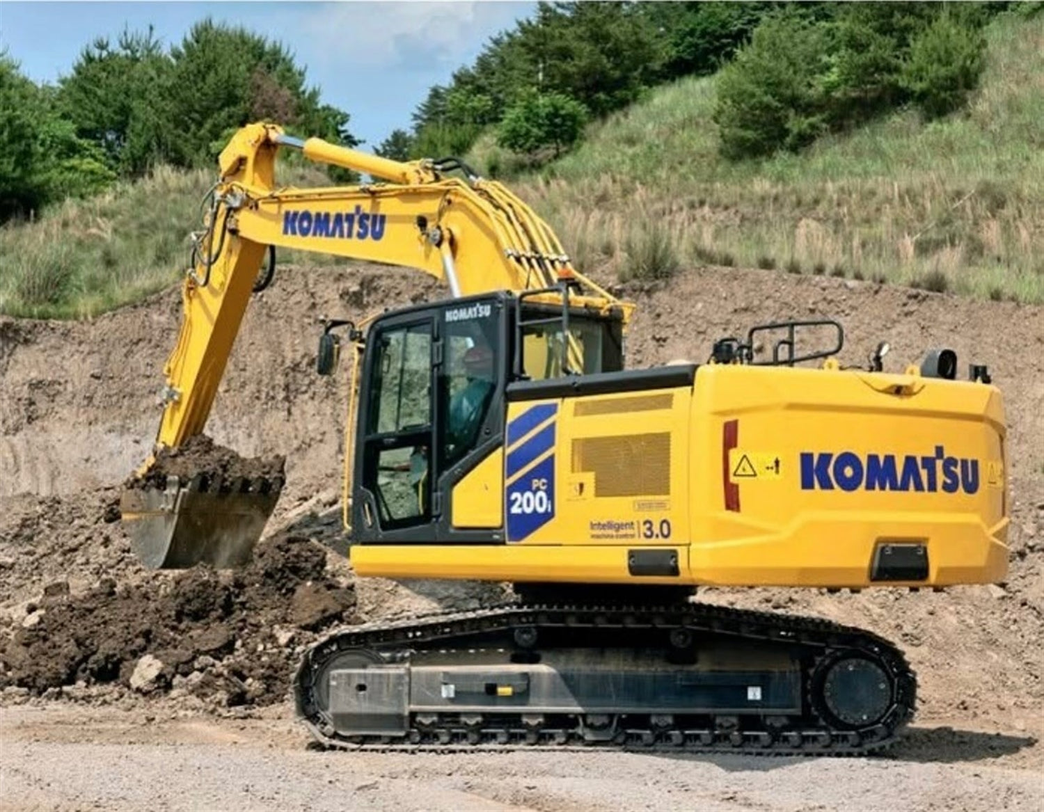 Komatsu excavator digging at a construction site