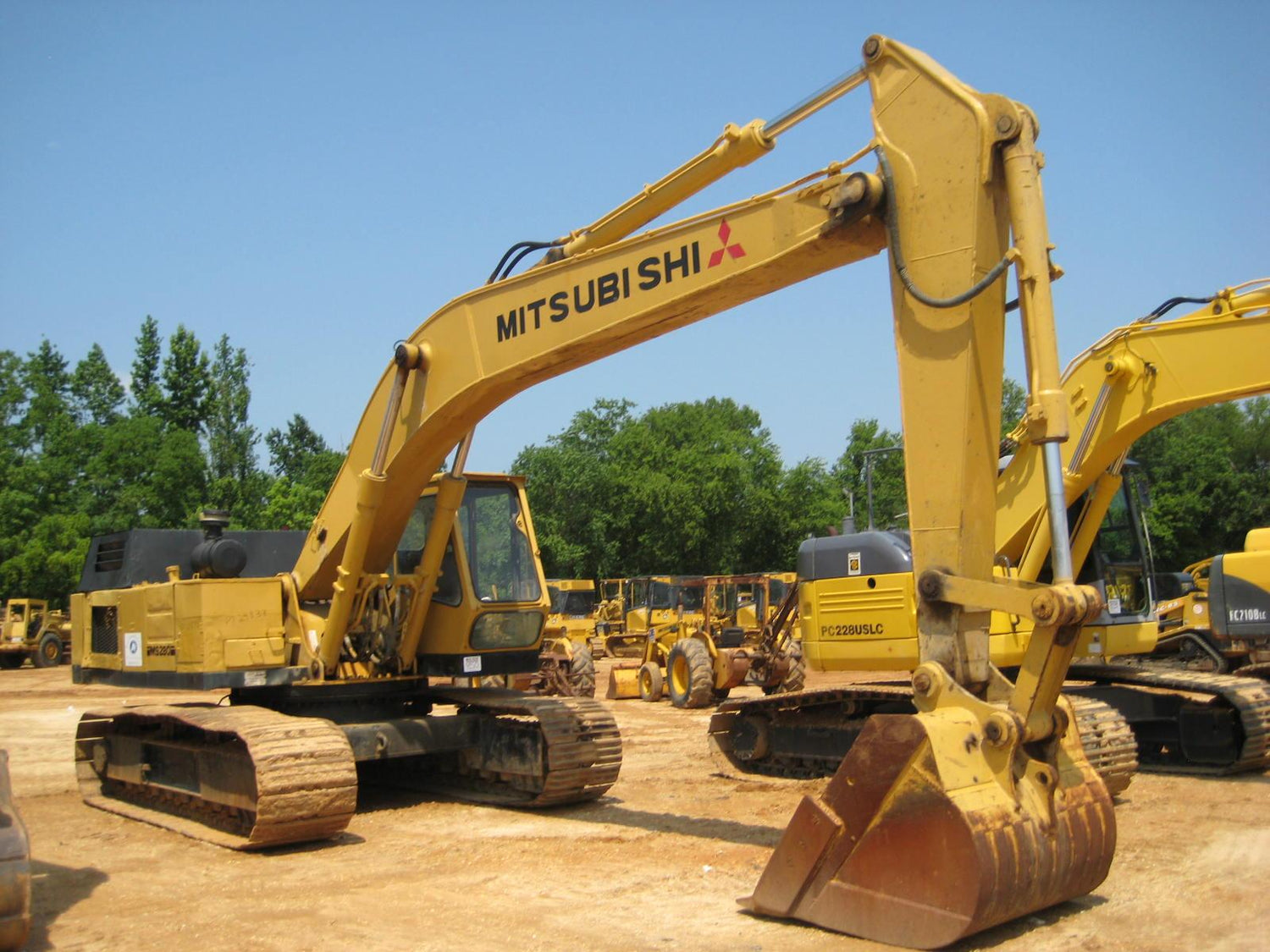 Mitsubishi excavator parked on construction site